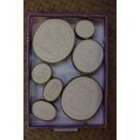 A set of twenty four 19th century Grand Tour type plaster intaglios,