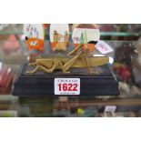 A Martins Bank 1563-1963 commemorative grasshopper paperweight, 13.5cm wide.
