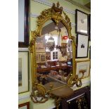 A Victorian gilt gesso framed four branch girandole, 138 x 78cm.