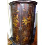 A George III chinoiserie bowfront hanging corner cupboard, 58cm wide.