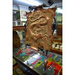 An Art Nouveau Newlyn style copper and steel easel back firescreen, possibly by John Pearson,