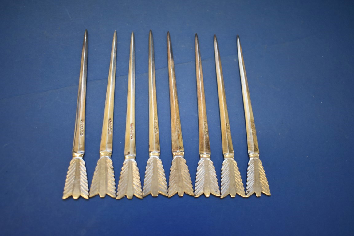 A set of eighteen silver fish knives and forks, by G A, London 1877, having bone handles.