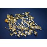 A quantity of various silver spoons; to include apostle spoons; grapefruit spoons etc, 595.5g.