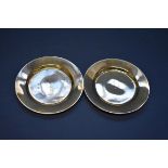 A pair of Tiffany & Co sterling silver pin dishes, 7.5cm, 40g.