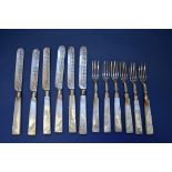 A Victorian set of six pairs of silver and mother of pearl handled dessert knives and forks,