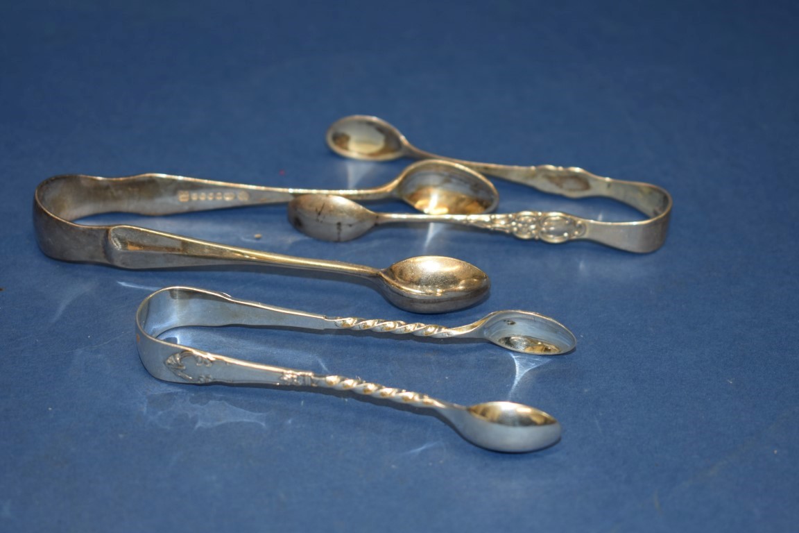 Five pairs of silver sugar tongs; together with two plated examples; - Image 4 of 5