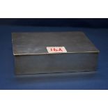 A .925 silver cigarette box, 14.3cm x 9.7cm. Condition Report: Hinge good.