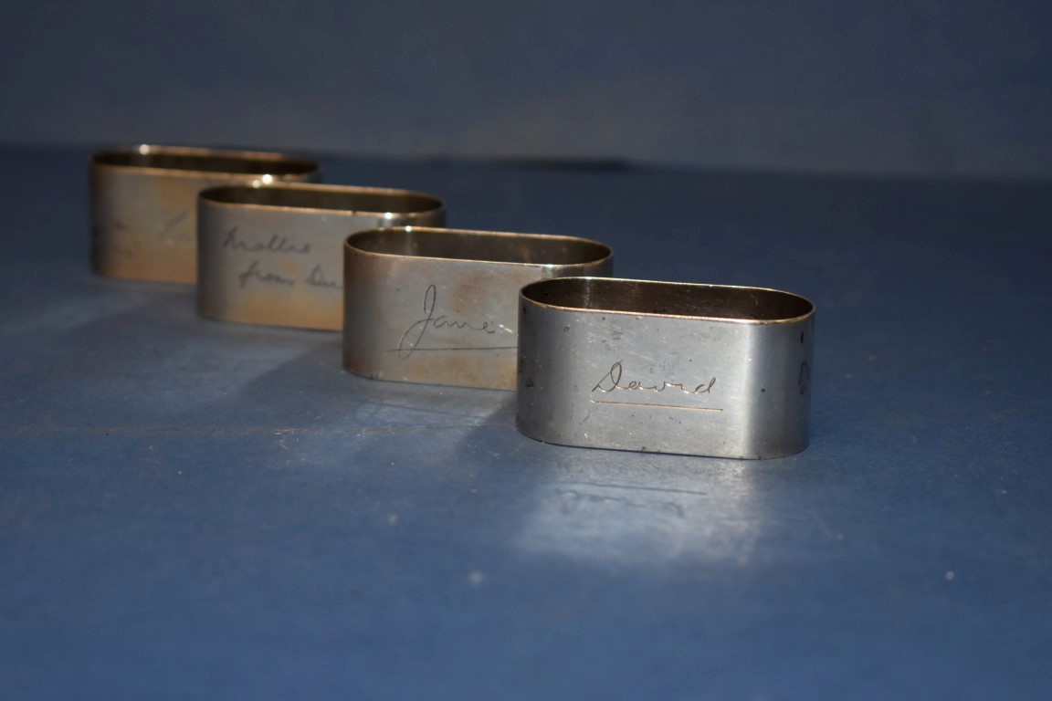 A set of four silver elliptical napkin rings, by D.