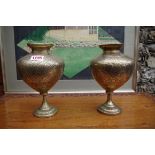 A pair of Indian brass vases, 20.5cm high.