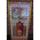 A framed Persian prayer mat, decorated with floral design, 115 x 58cm.