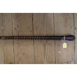 An old leather club or cosh, 60cm.