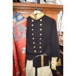 A late 19th/ early 20th century British Royal Naval Commander's uniform, comprising frock coat,