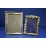 Three modern silver photograph frames; together with two silver plated examples.