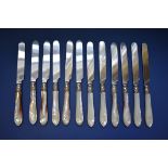 Twelve pairs of Victorian silver cake knives & forks, by Martin Hall & Co, Sheffield 1856/1858/1892,