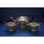 A silver three piece teaset, by E H P Co Ltd, Sheffield 1964, 884g all in.