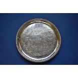 A George III silver salver, by Richard Sibley, London 1819, having later decoration, 21cms, 401g.