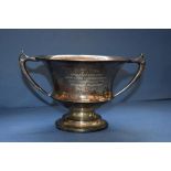 An Edwardian silver twin handled trophy cup, by Lee & Wigfall, Sheffield 1909, 12.5cm, 406g.