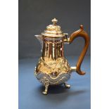 A George III silver coffee pot, by T S, probably London 1769, marks indistinct, 16cm, 320g all in.