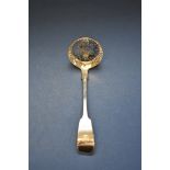 A Victorian silver sifter spoon, by Chawner & Co, London 1862; together with a pair of silver