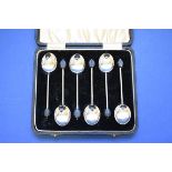 A cased set of six silver coffee spoons, by William Suckling, Birmingham 1936, having coffee bean