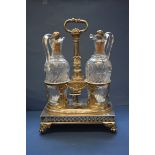 A French silver wine decanter stand, Paris 1796-1806, containing a pair of associated contemporary