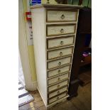 A modern cream and gilt painted ten drawer pillar chest, 40.5cm wide.