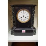 A Victorian slate and green marble mantel clock, 27cm high.