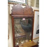 An 18th century walnut framed wall mirror, with shallow bevelled plate, 62.5 x 33cm.