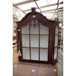 A Dutch style walnut small hanging display cabinet, 67cm wide.