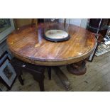 A 19th century rosewood circular tilt top dining table, 130cm diameter.