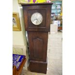 A 1920s oak small longcase clock, 137cm high.