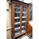 A 1920s oak bookcase, 92cm wide.