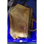 An old tan leather overnight bag, by L'Amica.