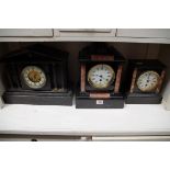 Three slate mantel clock.