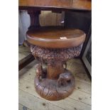 Ethnographica: an African carved table or stool.