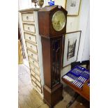 A 1920s oak small longcase clock, 136cm high.