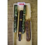 Two vintage fountain pens, each with 14ct nib; a propelling pencil; an antler handled knife; and one