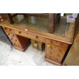 A late Victorian mahogany pedestal desk, 121cm wide.