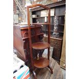 A 1920s mahogany folding three tier cake stand.