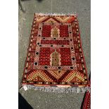 A Persian rug, having allover geometric design, 140 x 84cm.