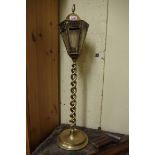 An unusual brass lantern form table lamp, total height 69.5cm.