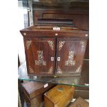 A Victorian rosewood and mother of pearl table top casket, with hinged top and pair of doors