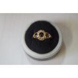 An 18ct gold illusion set solitare ring; together with two yellow metal gem set rings; and a pair of