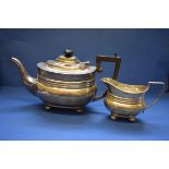 An Edwardian silver teapot and jug,Êby R F Mosely, Sheffield 1907, 797g all in.