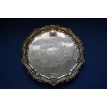 An Edwardian silver salver, by Walker & Hall, Sheffield 1904, 25cm diameter, 516g.