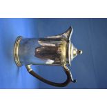 An Edwardian silver hot water jug,Êby William & Hutton & Sons Ltd , London 1904, 19.5cm, 498g all