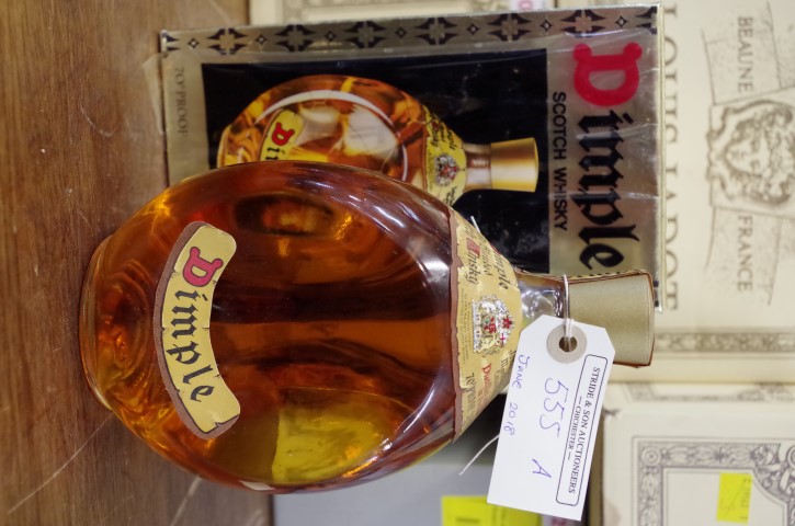 A 26 2/3 fl.oz. bottle of Haig's Dimple whisky, 1960s bottling, in card box.