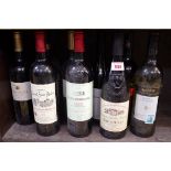 Nine various 75cl bottles of wine, to include: a 2005 Chateau Barrail Saint Andre Saint Emilion; a