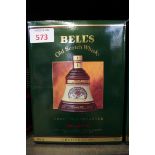 A 75cl Wade decanter of Bell's Christmas 1992 blended whisky, in card box.