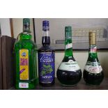 A bottle of Giffard creme de cassis; together with a 1 litre bottle of Pisang Ambon; a 70cl bottle